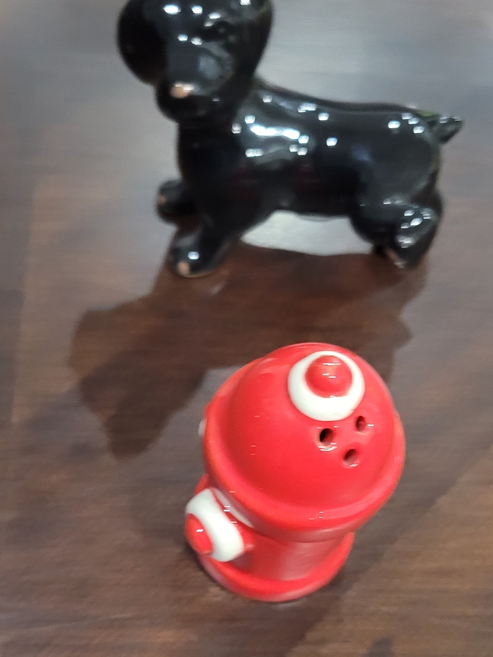 Pier 1 Red and White Ceramic Fire Hydrant Salt Shaker with Black Dog Accent